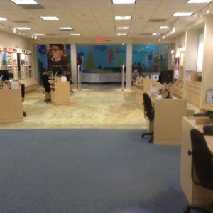 Flooring removal in progress during carpet replacement in commercial space in Plantation, FL.