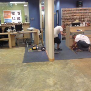 Commercial carpet installation in progress by professional flooring team in Plantation, FL.