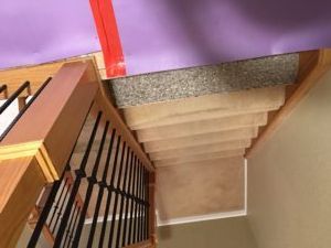 Residential staircase featuring freshly installed carpet by flooring professionals in Plantation, FL.