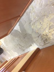 Commercial flooring professionals prepping uneven subfloor for vinyl flooring installation in Plantation, FL.