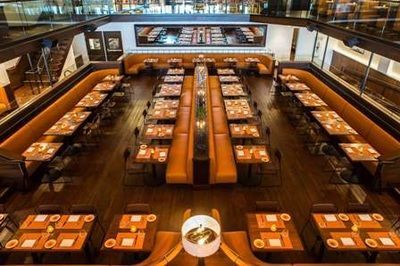 An aerial view of a restaurant with tables and chairs