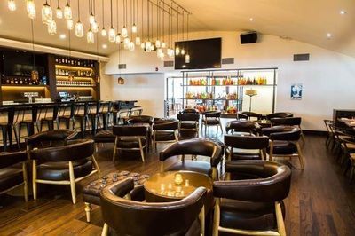 A restaurant with a lot of chairs and tables