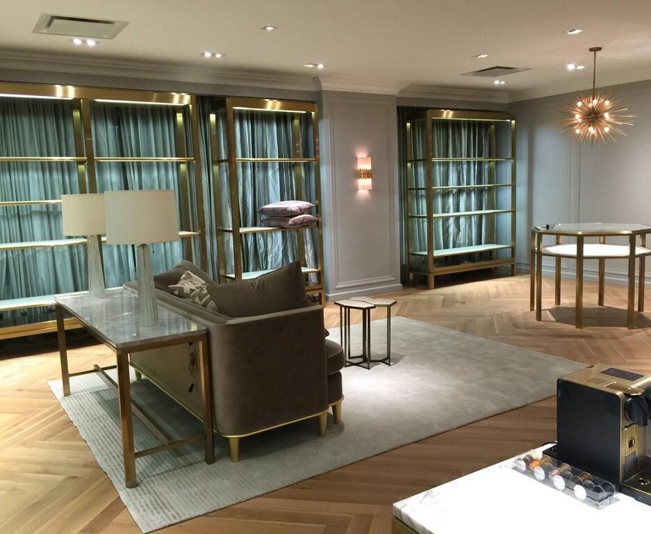 A living room with a couch and a table