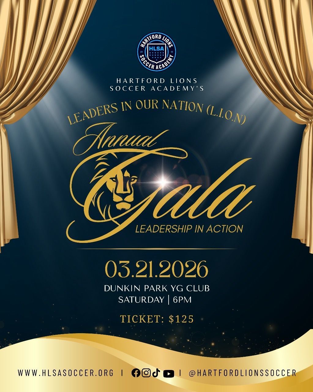 Doctor with stethoscope holds a clipboard, talking to a person seated in a medical office.