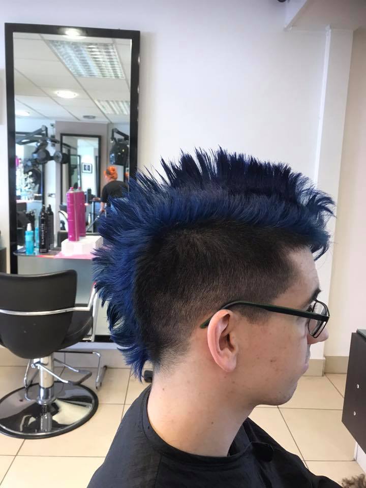 man with a blue mohican hairstyle