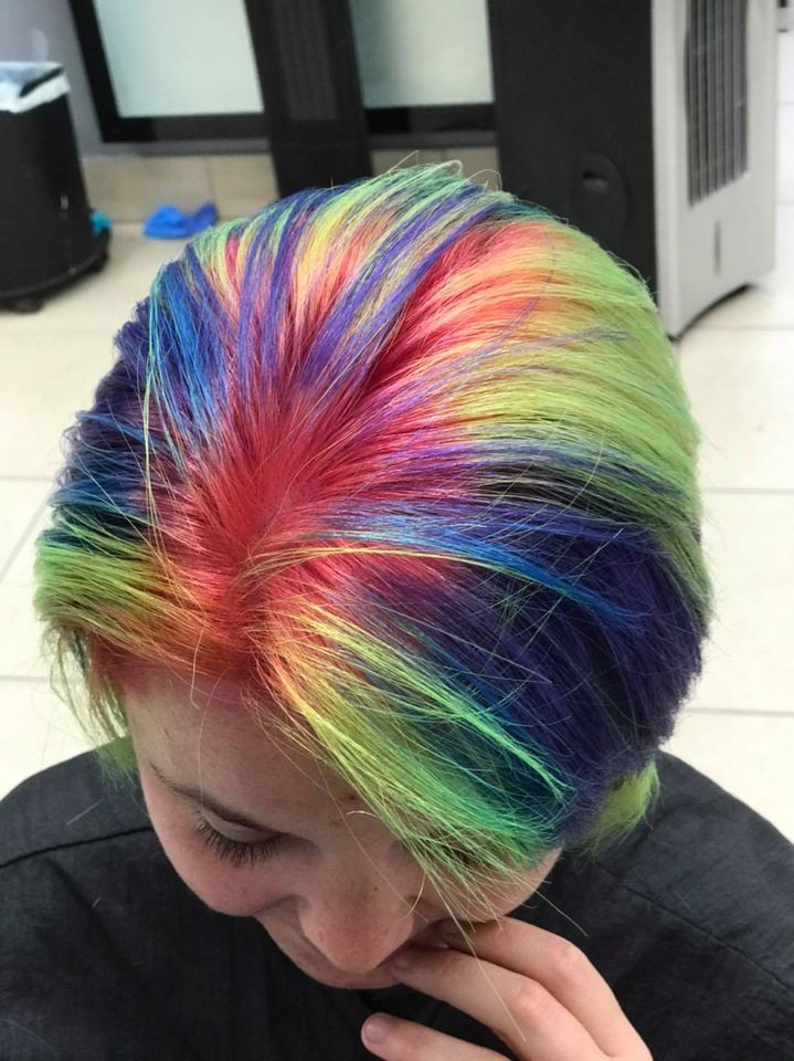 lady with short rainbow coloured hair
