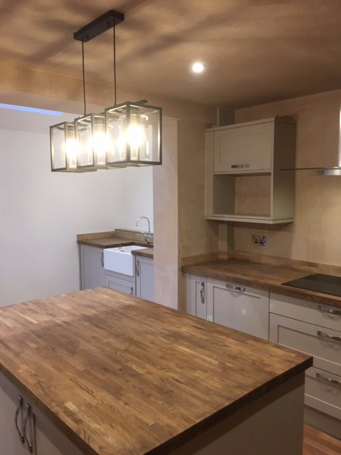 Plastering around a kitchen