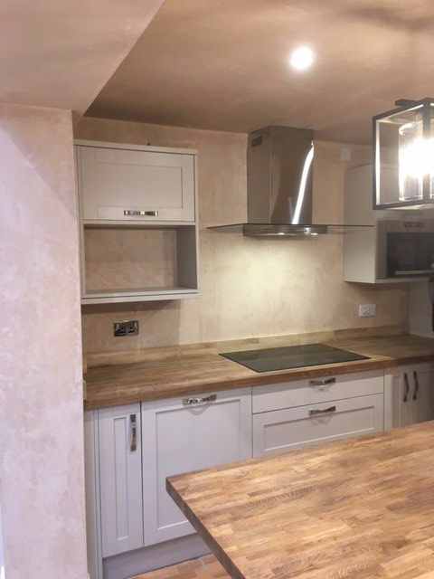 Plastering around a kitchen