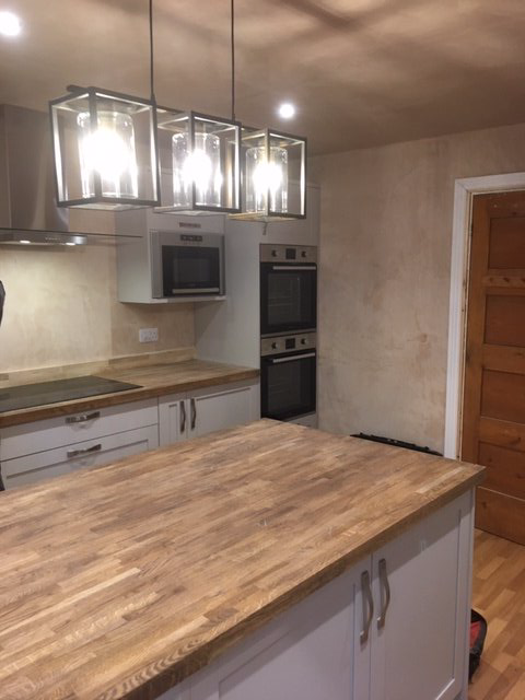 Plastering around a kitchen