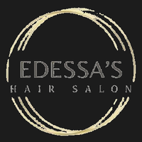 A logo for Edessa's Hair Salon with the name in light gray lettering centered inside a distressed gold circle.