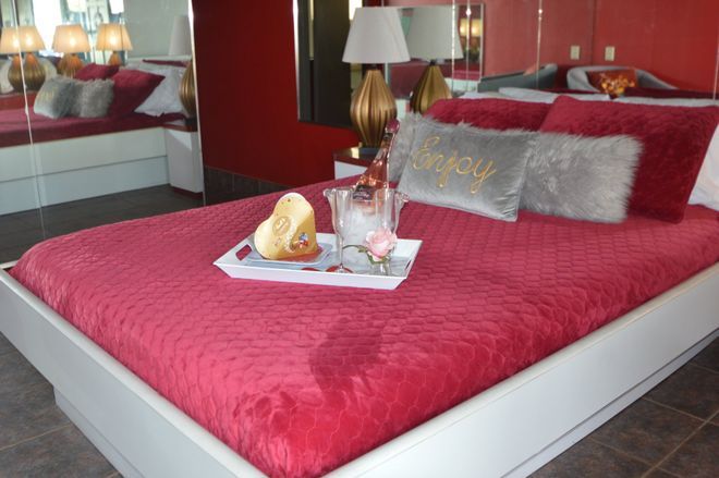 Red Bed With Welcome Drinks