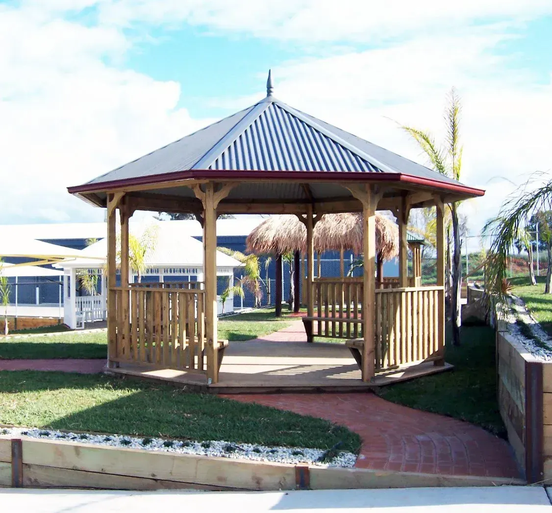 Wooden Gazebo With Corrugated Metal Roof — The Gazebo and Shade Centre in Jindera, NSW