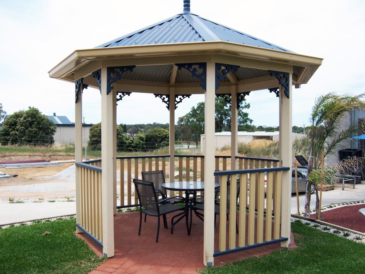 Gazebo With a Table and Chairs on a Red Brick Base — The Gazebo and Shade Centre in Jindera, NSW