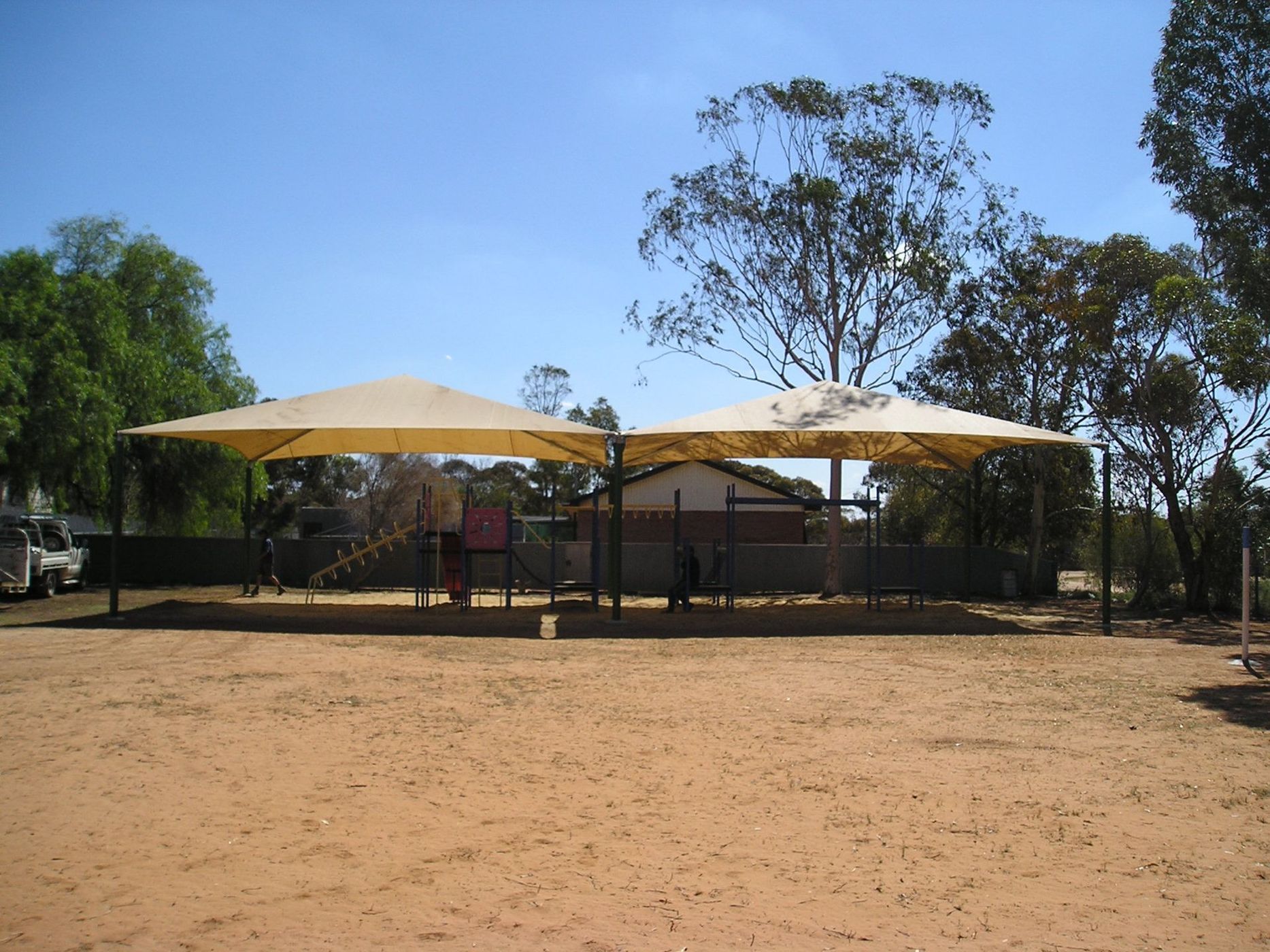 Two Beige Sun Umbrellas Provide Shade Over — The Gazebo and Shade Centre in Jindera, NSW