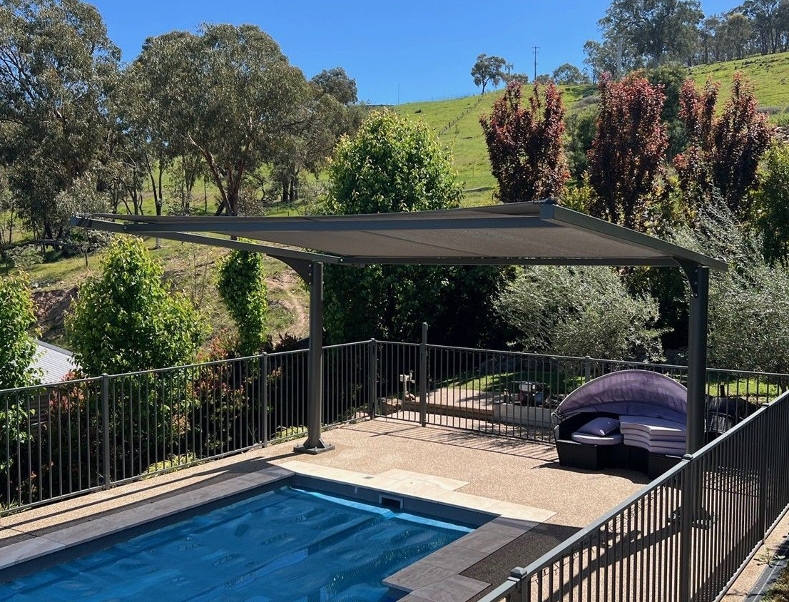Swimming Pool With Dark Shade Structure — The Gazebo and Shade Centre in Jindera, NSW