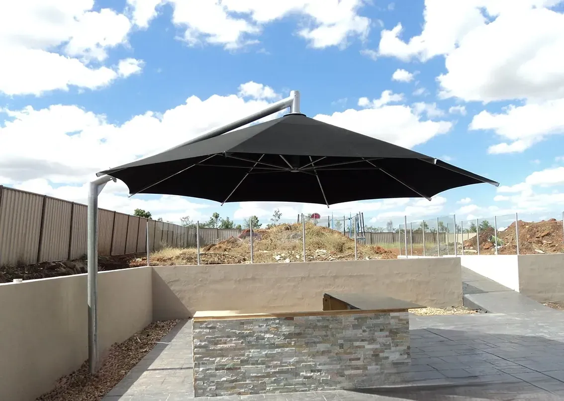 A Cantilever Umbrella Over a Tiled Courtyard — The Gazebo and Shade Centre in Jindera, NSW