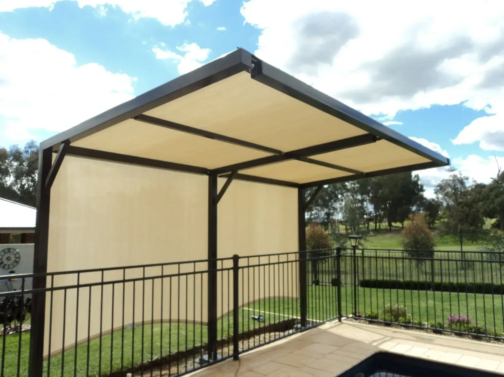 Beige Canopy Provides Shade Over a Patio Area — The Gazebo and Shade Centre in Jindera, NSW