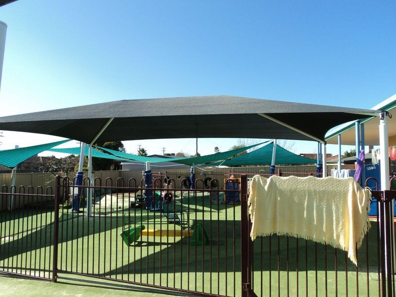 Playground With Green Turf, Black Fence — The Gazebo and Shade Centre in Jindera, NSW