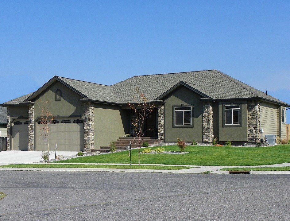 Repainted Green Stucco Home