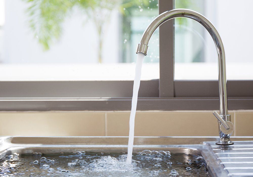 Sink and Flowing Water — El Paso, TX — Plumbers Drain Cleaning