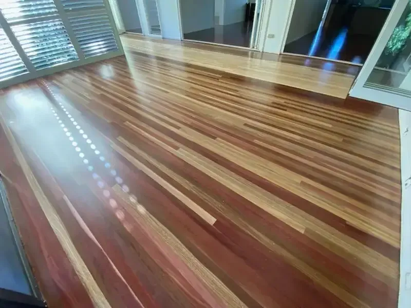 A Wooden Floor In A Room With Shutters On The Windows — Dale Dow Floor Sanding In Kirwan, QLD