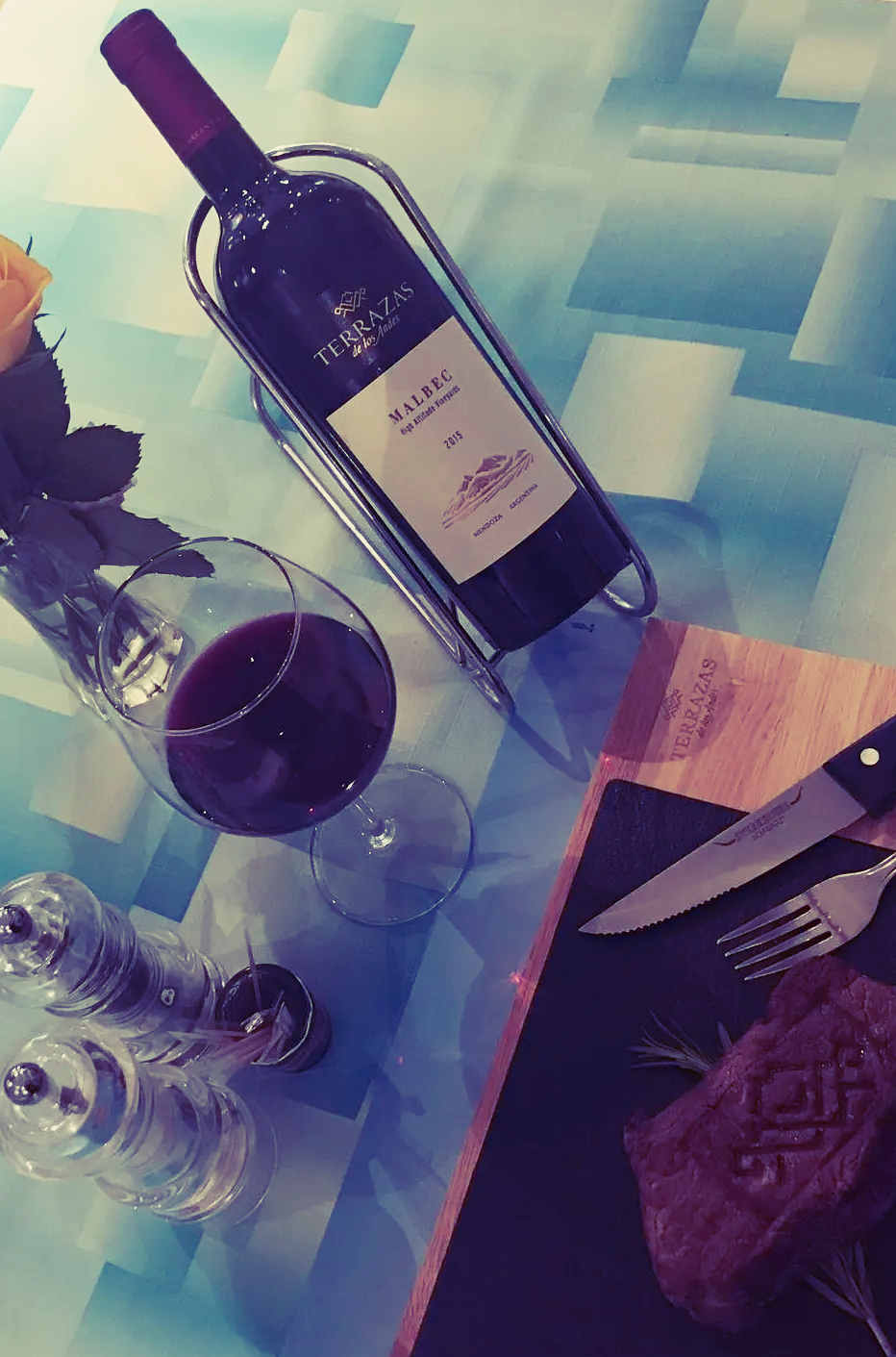 Wine bottle and glass