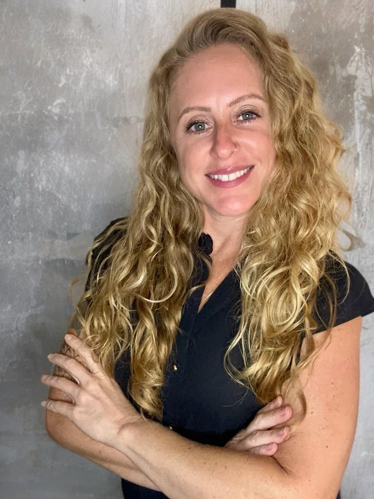 A woman and a child are smiling for the camera