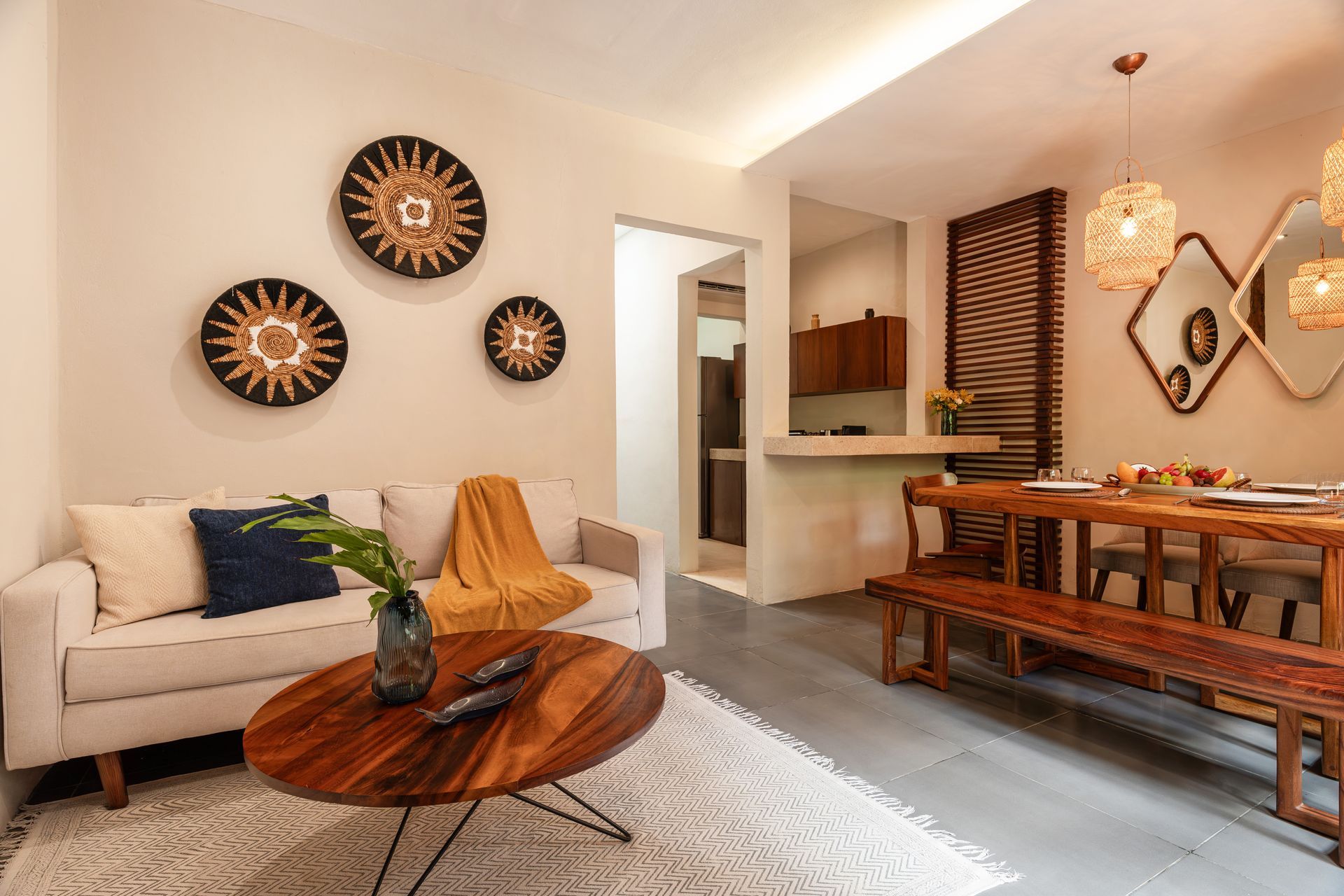 Living room with sofa, wooden table, and wall decor.
