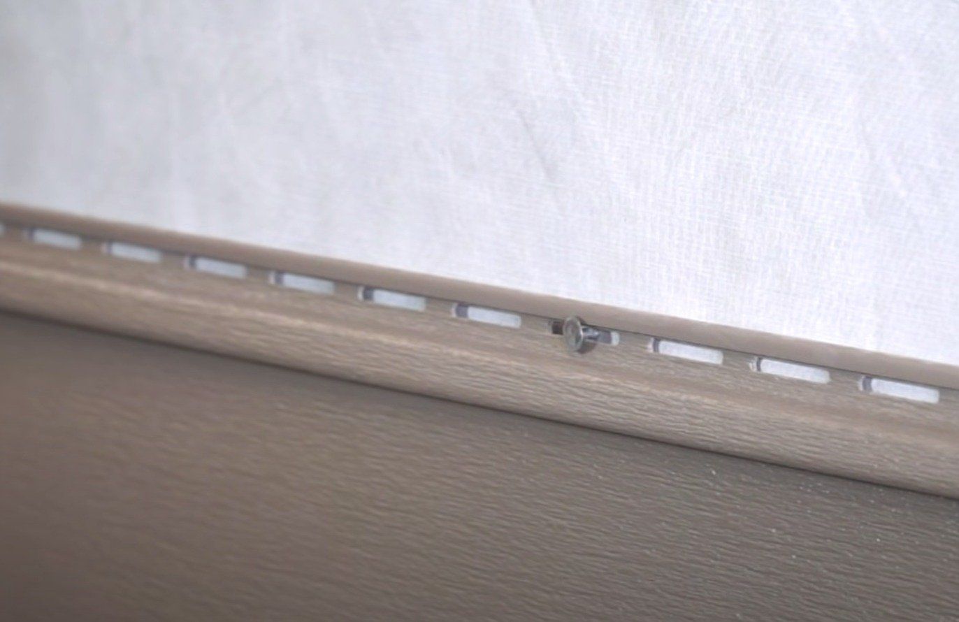 installation of siding on home