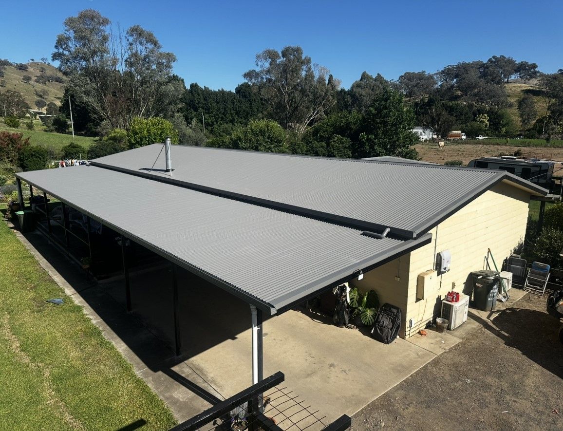 Metal Roof and Guttering on a Home — Essential Roofing and Plumbing in Wagga Wagga, NSW