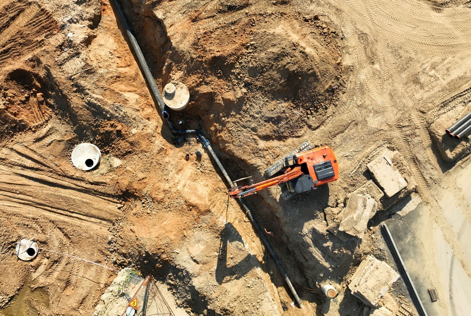 Sewage drainage system mounting at construction site