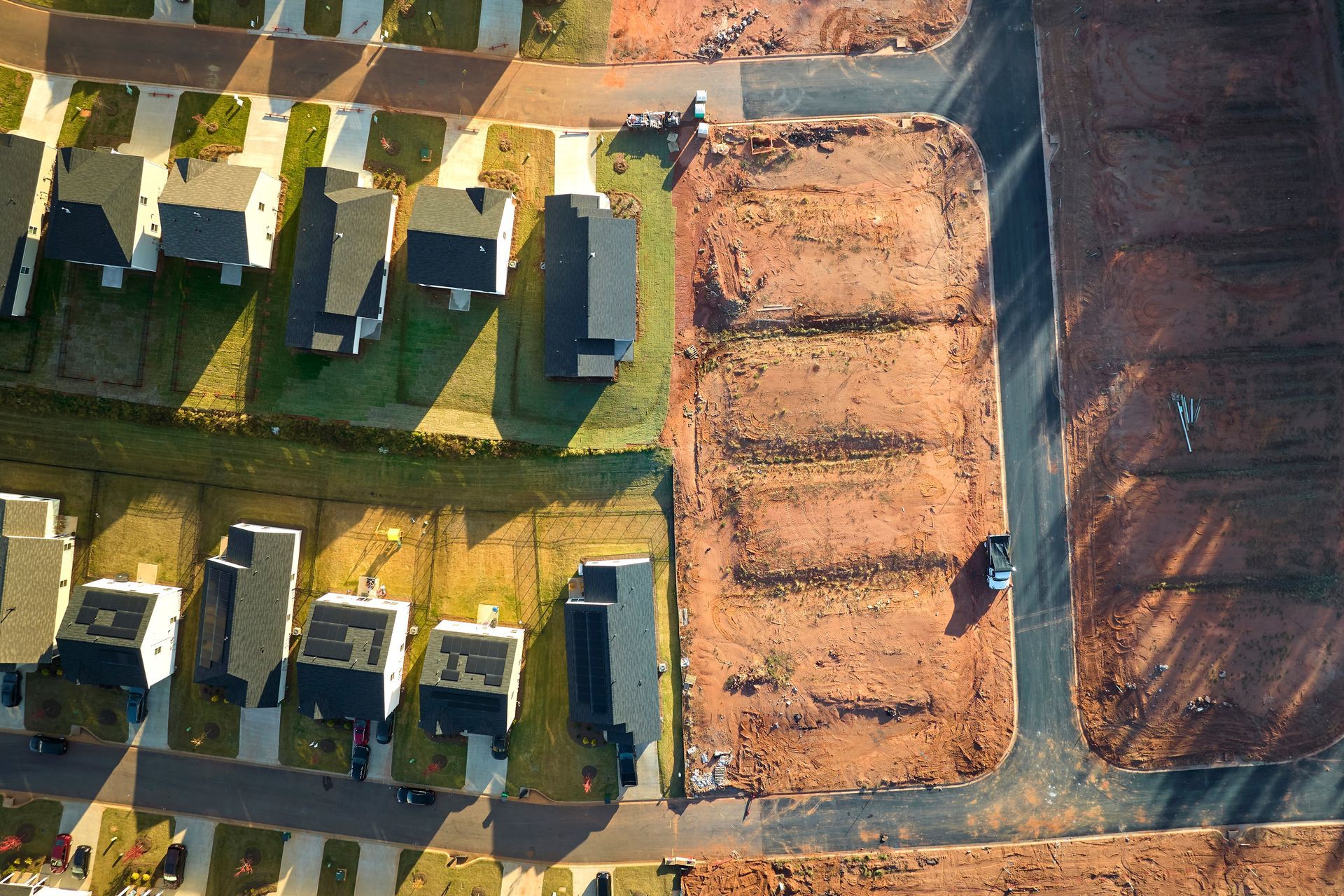 View from above of densely built residential houses under construction