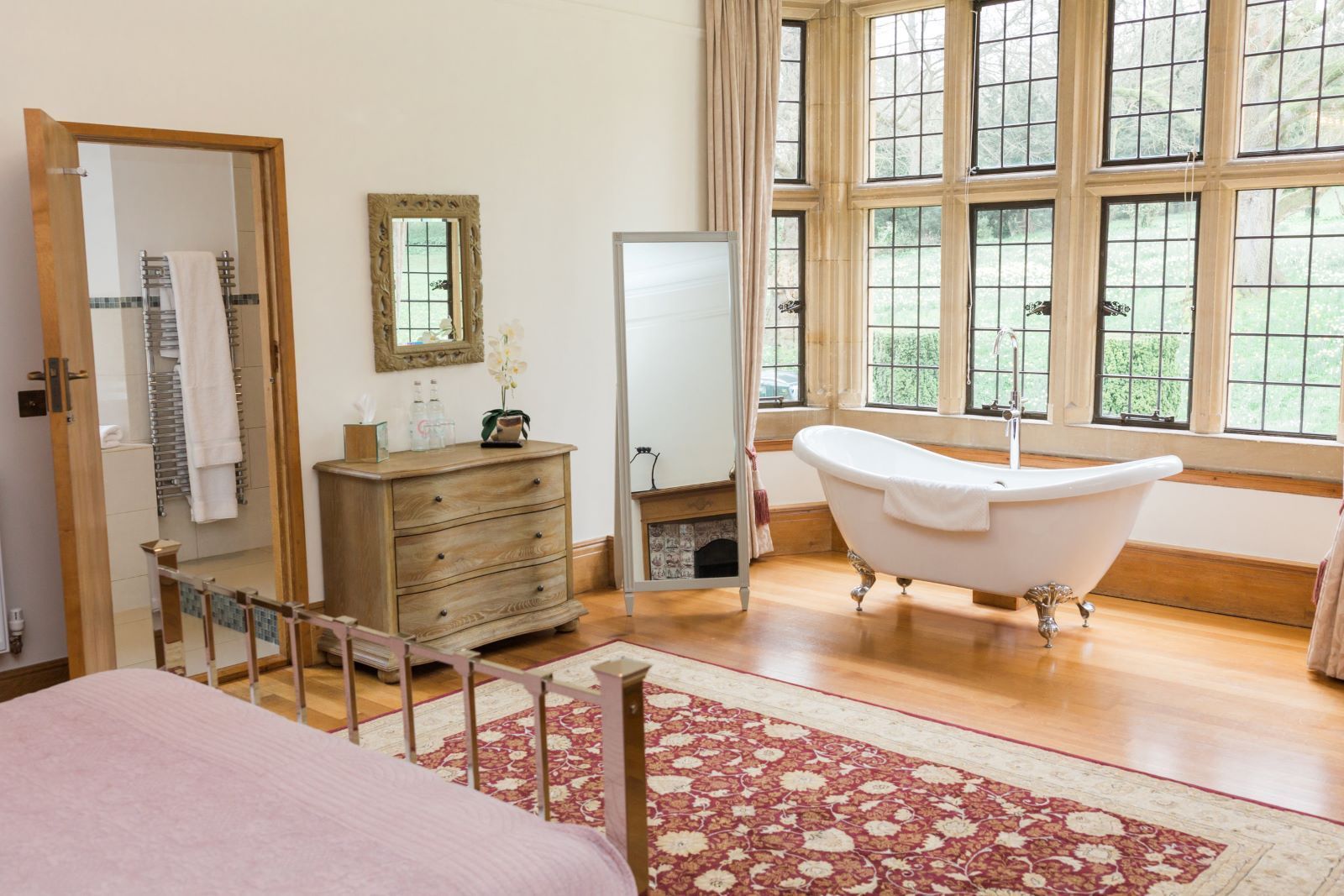 There is a bathtub in the middle of the room.