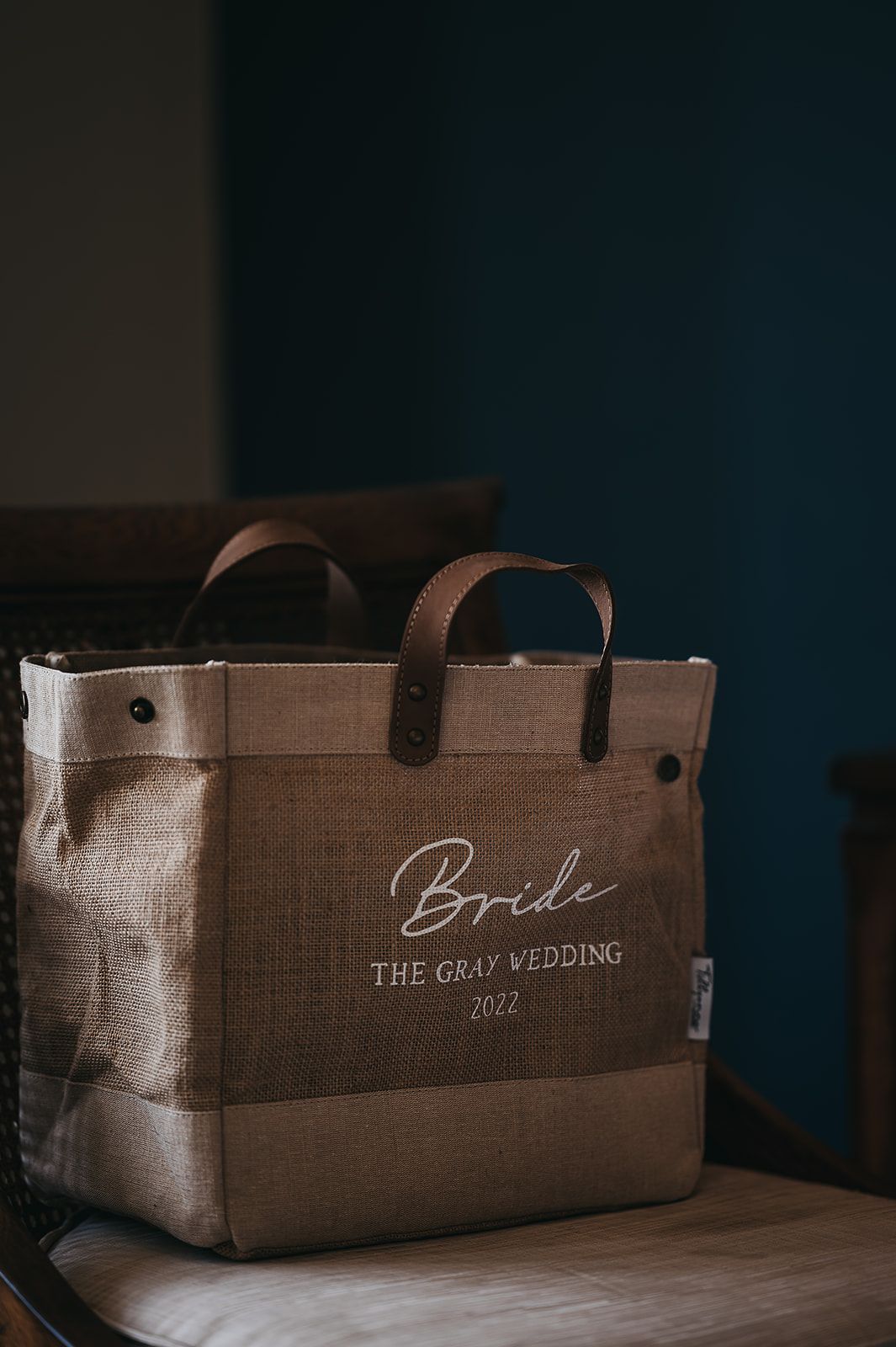 A tote bag is sitting on top of a chair.