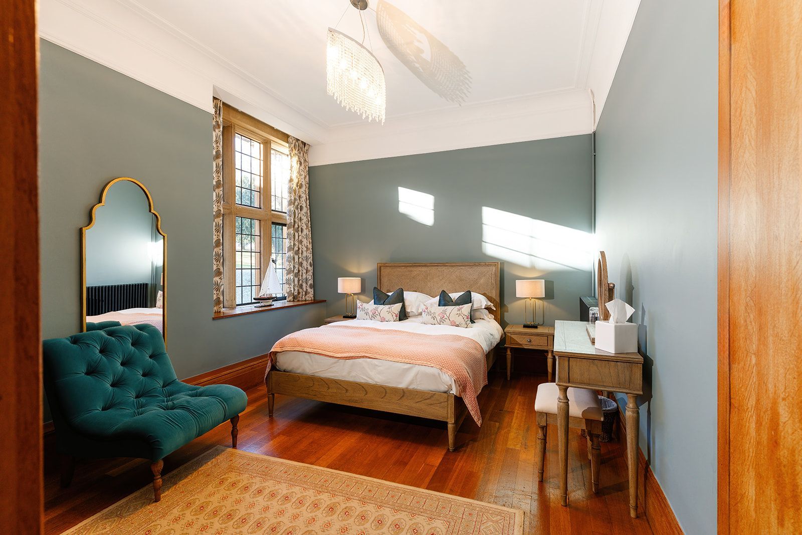There is a large bed in the middle of the room.