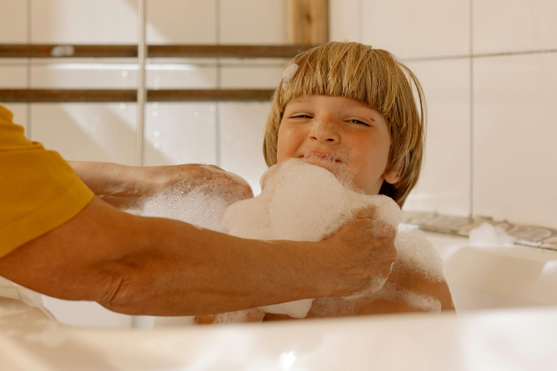 kid taking a bath