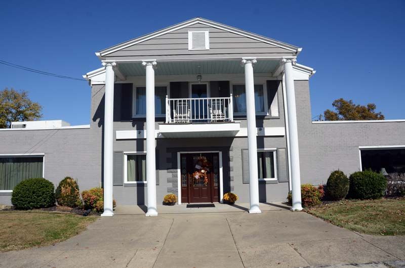 Interior and exterior view of Tomblinson Funeral Homes in Sebree KY