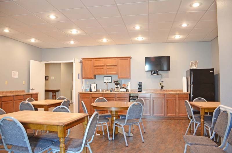 Interior and exterior view of Tomblinson Funeral Homes in Henderson KY