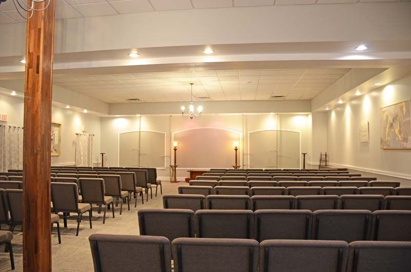 Interior and exterior view of Tomblinson Funeral Homes in Henderson KY