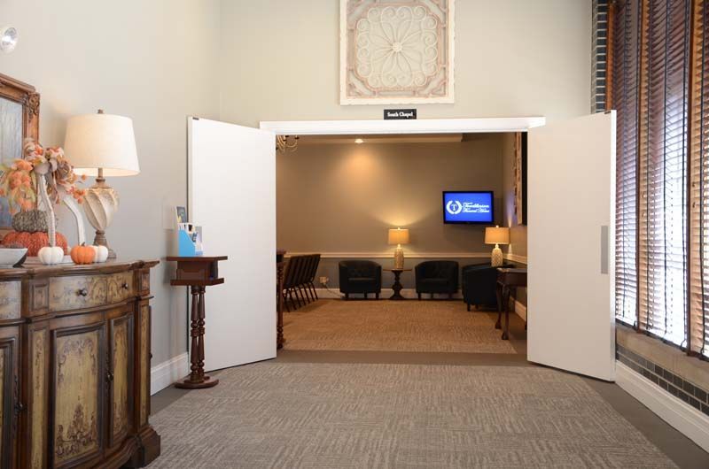 Interior and exterior view of Tomblinson Funeral Homes in Henderson KY