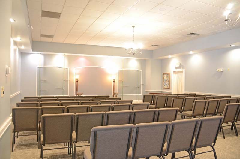 Interior and exterior view of Tomblinson Funeral Homes in Henderson KY