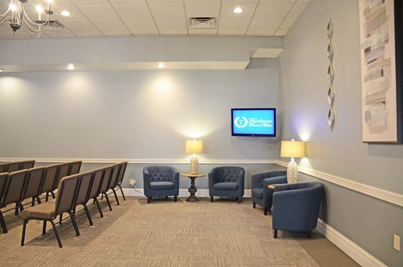 Interior and exterior view of Tomblinson Funeral Homes in Henderson KY