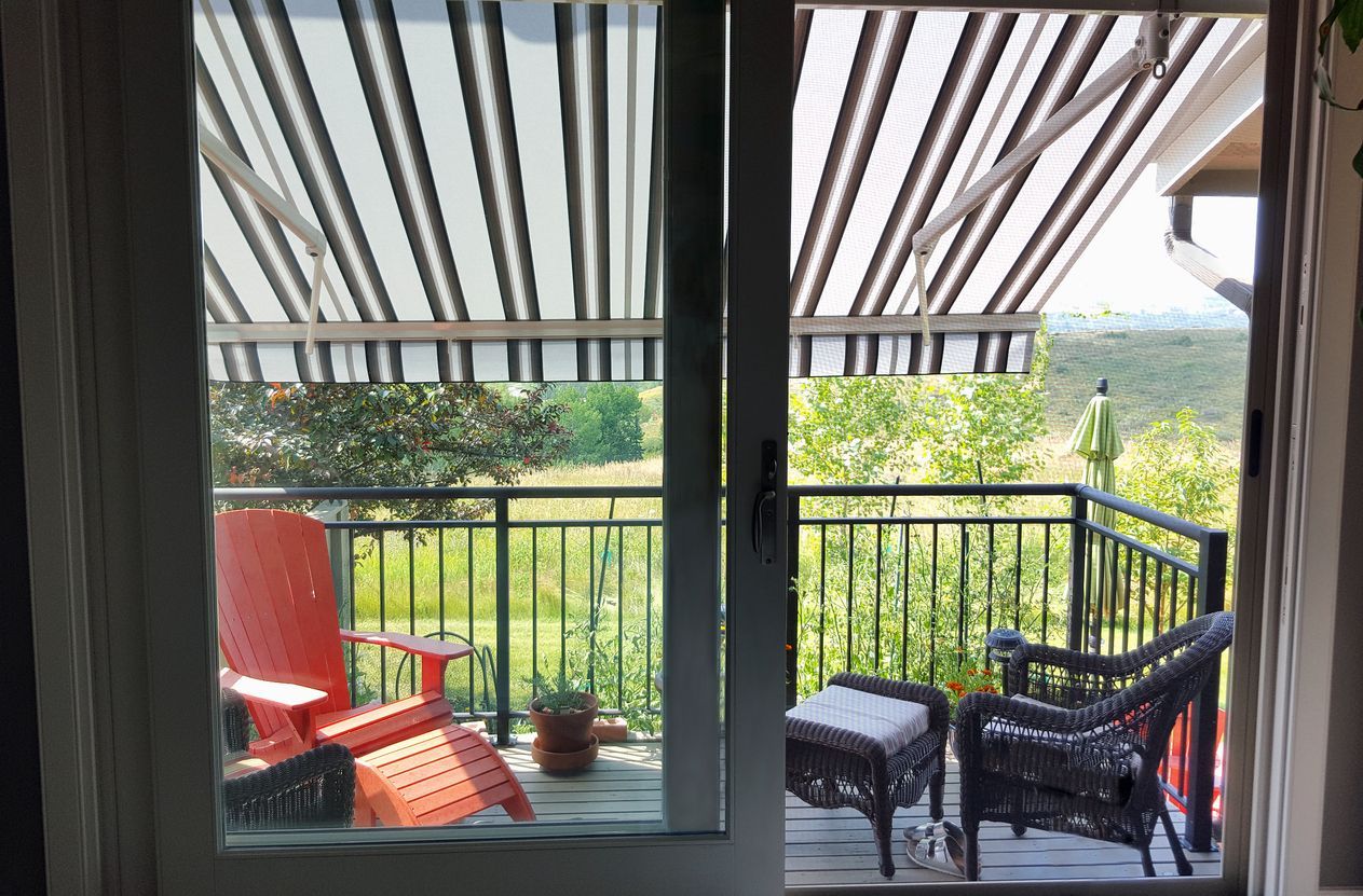 Interior shot of awning over sliding glass door to the patio