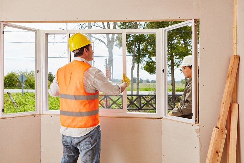 Window Installation being performed by Greenhagen Homes contractor