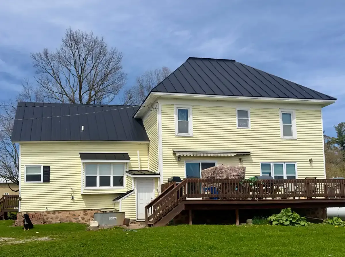 Residential Hail Damage Metal roof and siding replacement by roofing contractor Badgerland Restoration & Remodeling