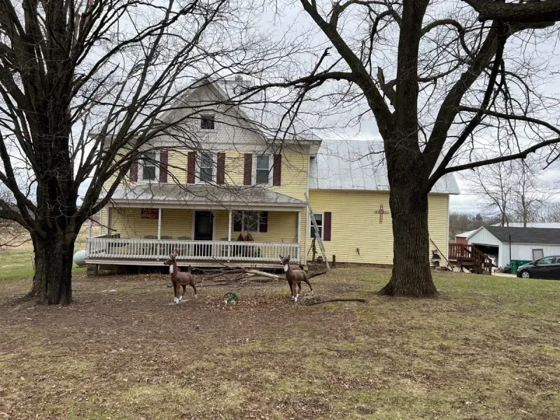 Residential Hail Damage Metal roof and siding replacement by roofing contractor Badgerland Restoration & Remodeling