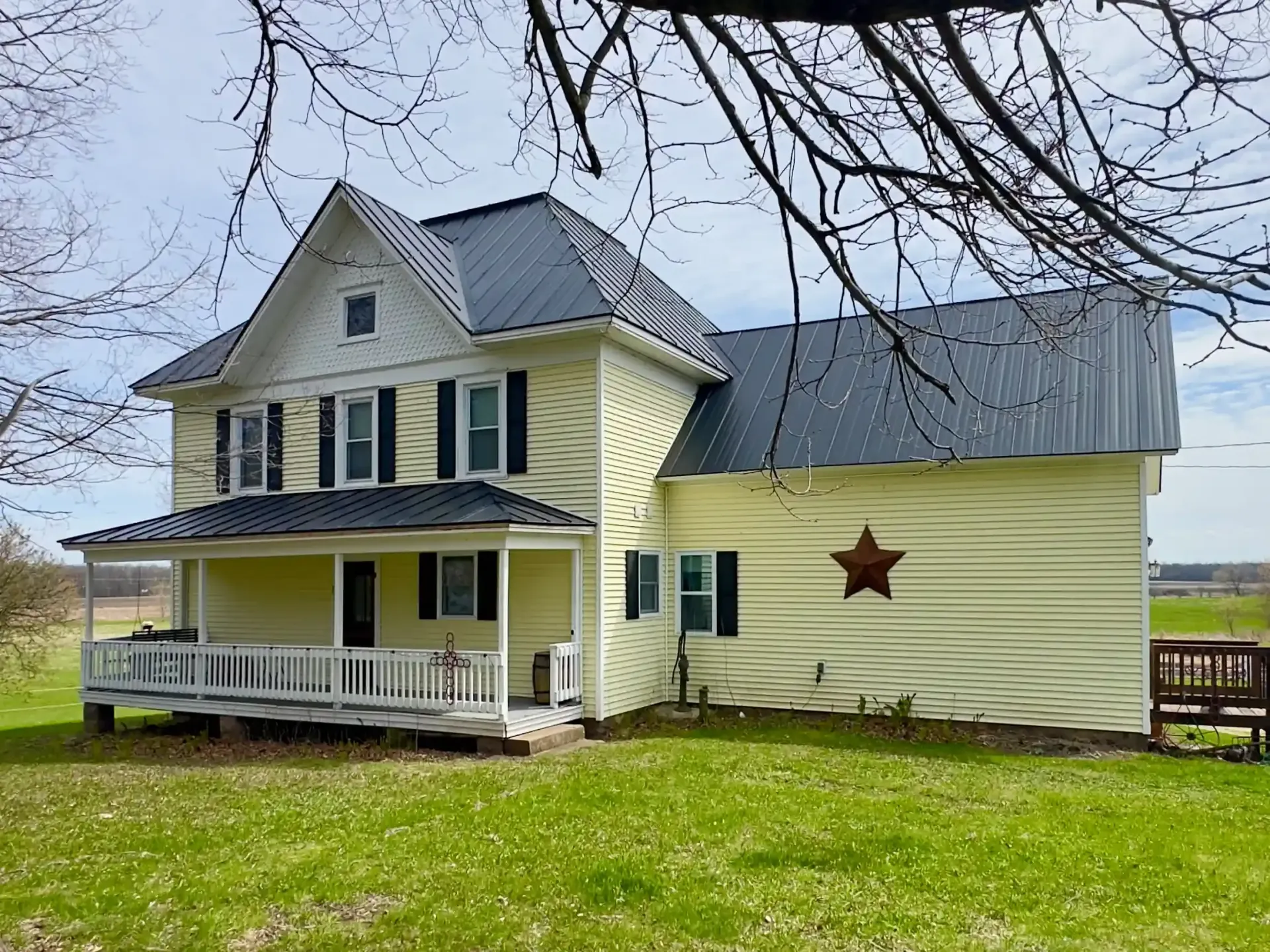 Residential Hail Damage Metal roof and siding replacement by roofing contractor Badgerland Restoration & Remodeling