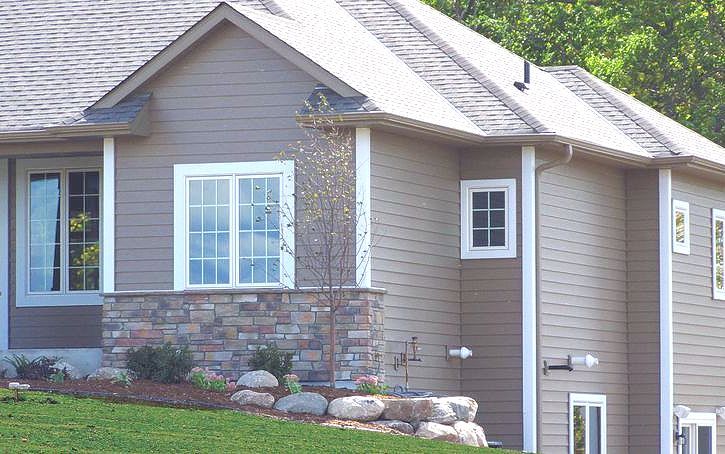 Types of siding. Durable and eco friendly steel siding for home exterior. Edco Steel Lap Siding in the color Canyon