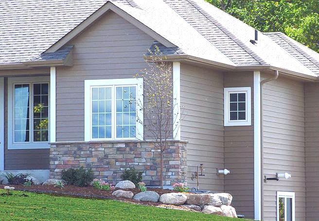 Edco Steel Lap Siding canyon Replaced by Badgerland Restoration & Remodeling