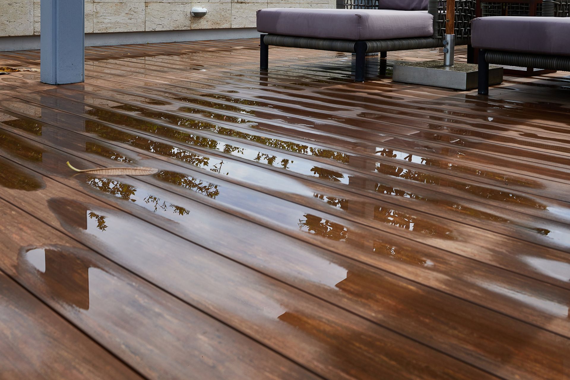 Wood floor damage repair caused by flood water from ice dams, burst pipes, or weather.